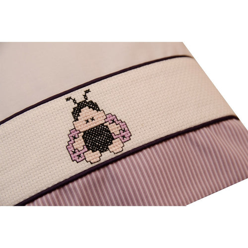 almohada mariquita lila